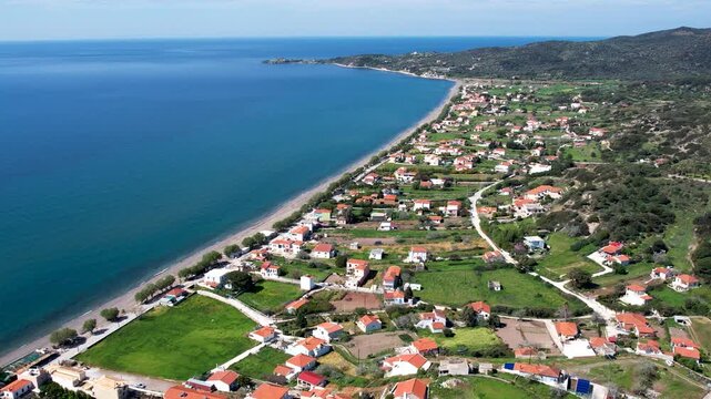4k drone video overflying the traditional settlment of Vatera, Lesvos island, Greece, with its long beach and great sea views. 