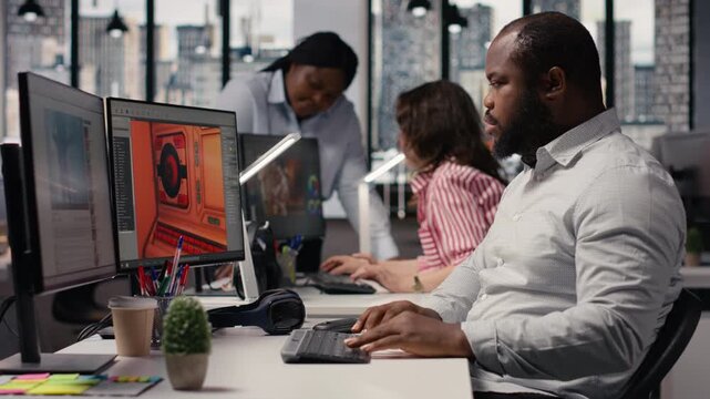 Black male game developer creating futuristic space video game, engineer uses programming tools and modeling software. Building a virtual world with spaceships and stations, automation.