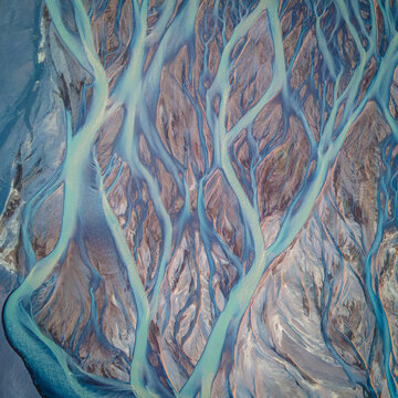 Aerial View of Glacial River Delta Meeting Ocean in Iceland