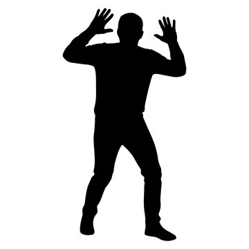 Silhouette of a man with hands raised in surrender or defense.