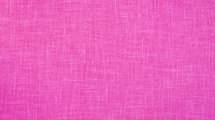Fototapeta premium Bright pink fabric with a smooth texture used for sewing and crafting projects in various settings and light conditions