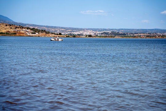 Vourkari Wetland Megara Greece Seascape with Abandoned Boat and Coastal Landscape