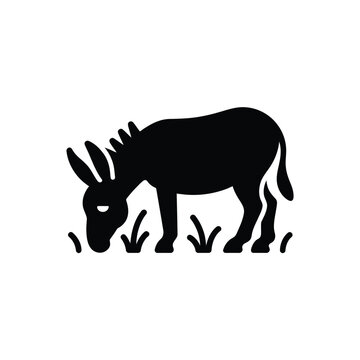 A simple black silhouette of a donkey grazing in tall grass