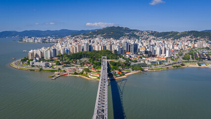Obraz premium Aerial view of Hercilio Luz Bridge leading to Florianopolis skyline in Santa Catarina Brazil. 