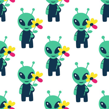 Cute cartoon alien holding a flower seamless pattern.
