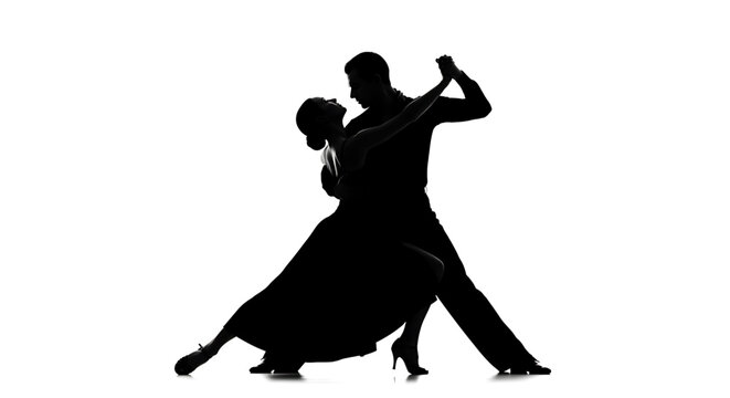 A silhouette of a couple dancing together in a romantic and elegant pose