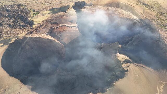 Masaya volcano crater above top drone view at sunset light time