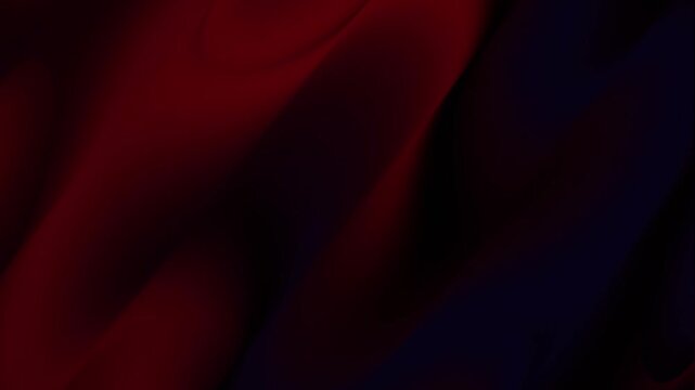 Elegant flowing crimson and deep indigo fabric texture background creating a luxurious abstract pattern