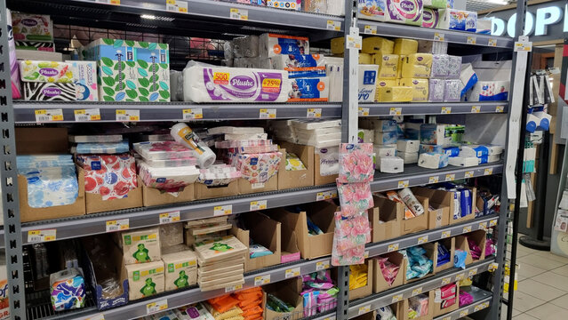 Paper products and tissues on supermarket shelves in retail store