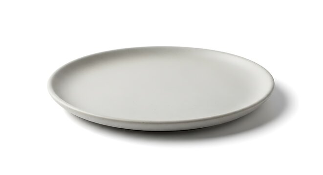 Empty grey ceramic plate isolated on white background with soft side shadow and matte surface.