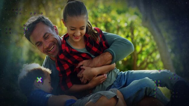 Dad holding daughter son climbing in sparking tumbling hugging family ad animated dots  and  Xs show