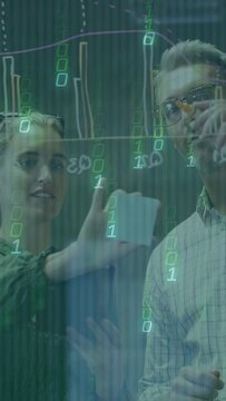 Vertical video: Team using tablet, placing note and marking board, green overlay showing analytics