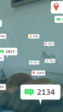 Vertical video: Cafe alert bubble making labels pinning near bread and tools as pan showing orders