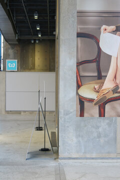 TOKYO, JAPAN - April 8, 2026: Detail of a Miu Miu advert on a wall of Ginza Sony Park.