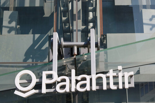 TOKYO, JAPAN - April 12, 2026: Palantir sign on the front of the building known as 'The Iceberg' which contains Palantir and Buzzfeed Japan offices and a Wework facility.