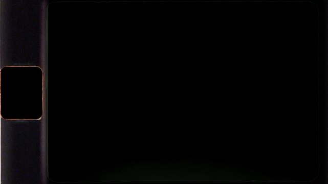 Film strip background with light leaks. 8mm Film Frame and Texture. Nostalgic Video Effect. 4K video.
