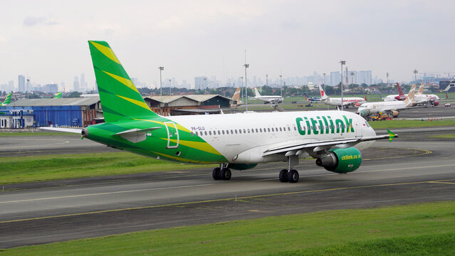 Side profile of Citilink Airbus narrow body aircraft parked at the apron area on April 14, 2026 in Soekarno-Hatta Interational Airport, Jakarta, Indonesia.