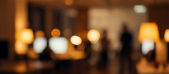 Fototapeta premium A blurred office scene with glowing lamps and indistinct figures, creating a warm and inviting atmosphere in a workspace environment.