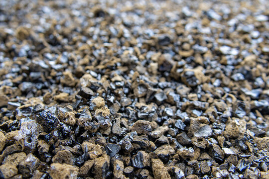 Macro view of volcanic tephra and lapilli cinders showing glassy basalt texture in Hawaii Volcanoes National Park on the Big Island of Hawaii
