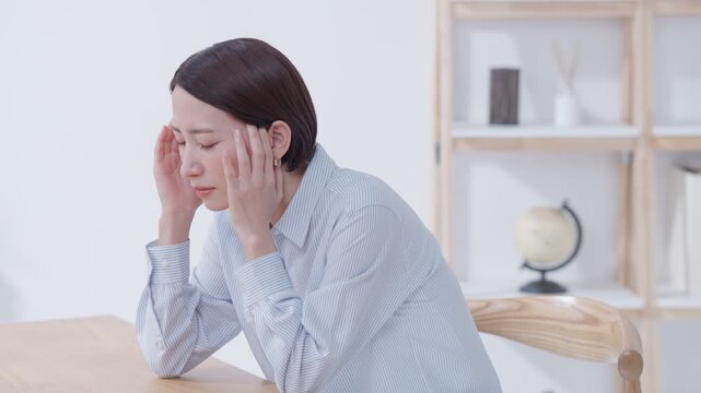 頭痛の女性