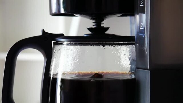 coffee maker machine brewing bean equipment close up pouring water drip in 4k HD footage
