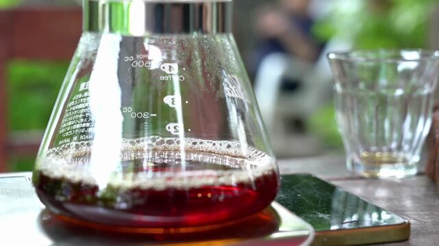 coffee maker machine brewing bean equipment close up pouring water drip in 4k HD footage