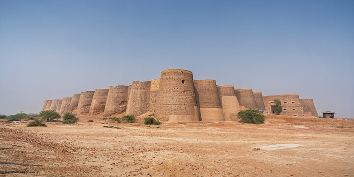 Scenic landscape view of famous historic Derawar fort brick ramparts and bastions in Cholistan desert, Bahawalpur, Punjab, Pakistan