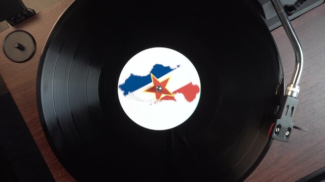 Starting Playback of Vinyl Record With Ex Yugoslavia Flag, Ex-yu Music Compilation, Top Down View