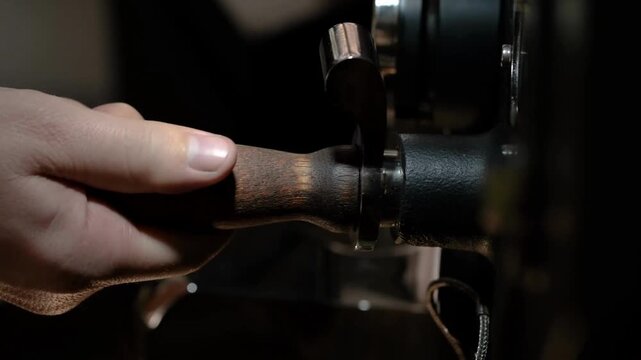 checking quality Coffee roasting process machine in small roaster factory burning cooling processes beverage
