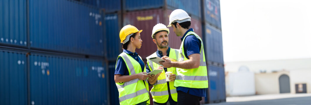 Ethnic diversity worker people, Success teamwork. Group of professional engineering people wearing hardhat safety helmet meeting and working with digital teblet.