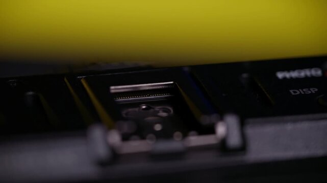 In a close-up view, the interior components of the hot shoe mirrorless camera are inspected during.