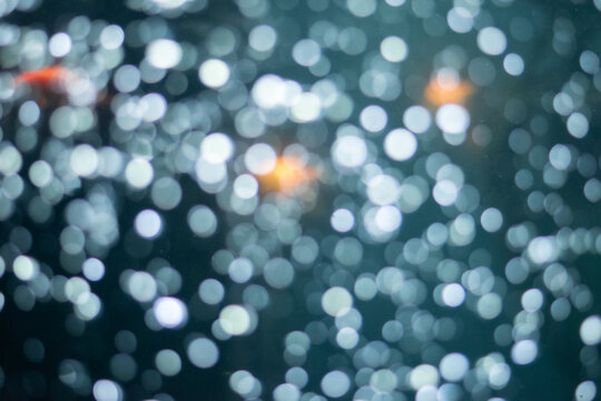 Abstract underwater scene in India, featuring vibrant bokeh ligh