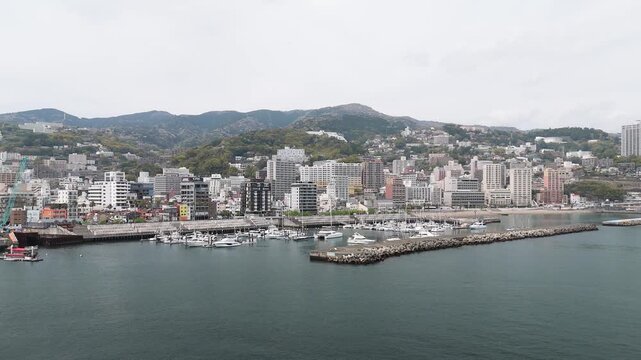 Aerial View of Atami City Along Sagami Bay Coastline Japan