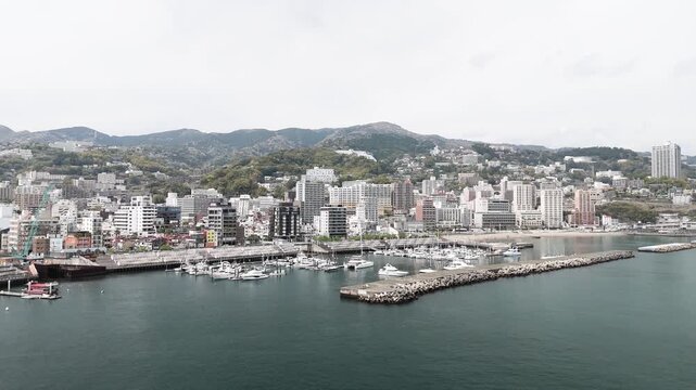 Aerial View of Atami City Along Sagami Bay Coastline Japan