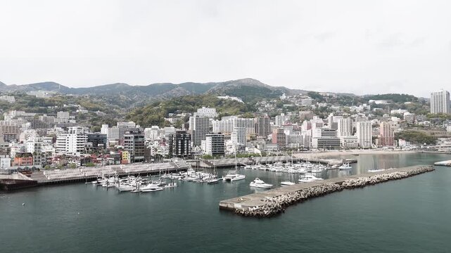 Aerial View of Atami City Along Sagami Bay Coastline Japan