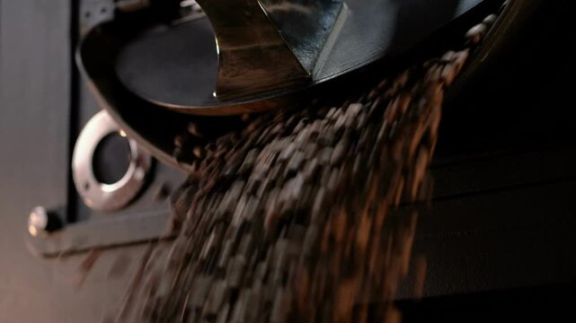 Coffee roasting process in small mixing rotor roaster factory burning cooling processes beverage