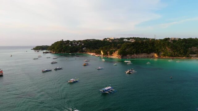 sail boat at sunset in Borocay island Philippines travel holiday destination in south east Asia , aerial drone view