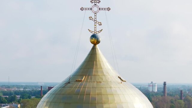 Drone slowly descends revealing golden dome details Liepaja Latvia