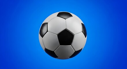Naklejka premium A close-up studio shot of a classic black and white soccer ball against a vibrant blue backdrop