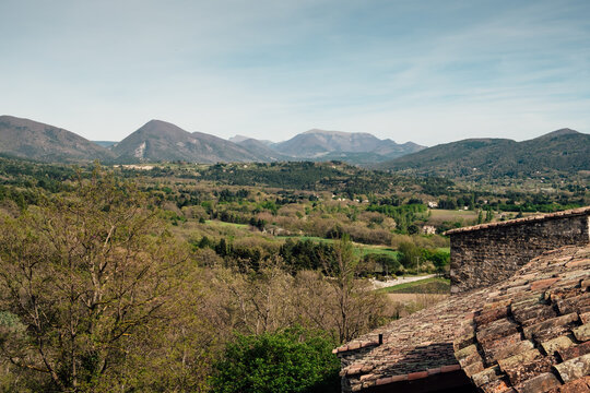 Observing the nature over the roof in the medieval village of Poet-Laval