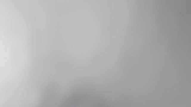 Blurry gray abstract background suitable for presentation slides, website headers, and digital design projects needing a subtle and muted aesthetic.