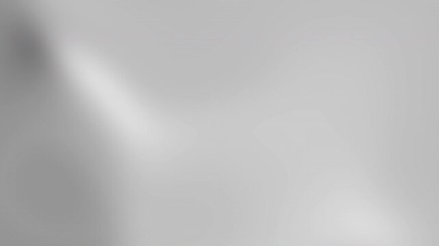 Abstract grey gradient with light and dark spot. Suitable for background designs, website banners, album covers, and digital presentations.