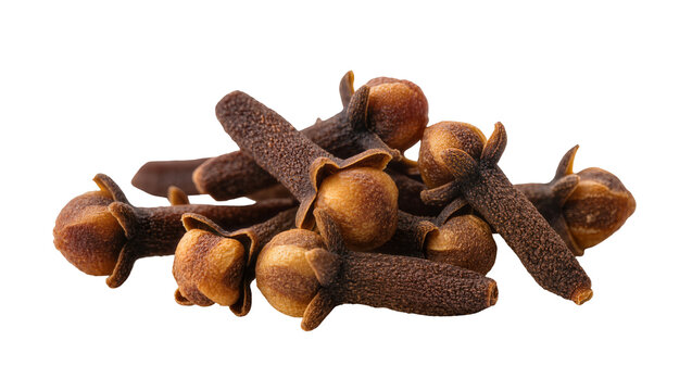 Brown aromatic whole cloves scattered in a pile