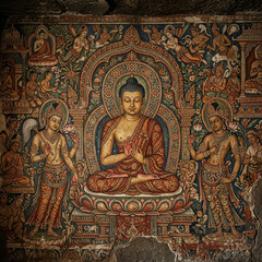 Fototapeta premium Ancient Ornate Wall Painting of Lord Buddha in a Historical Temple
