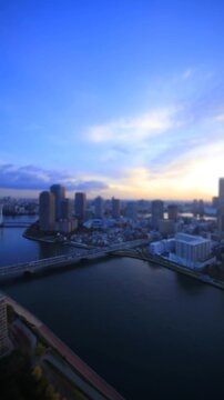 明石町から望む佃のマンション群と隅田川の一日のミニチュア風景