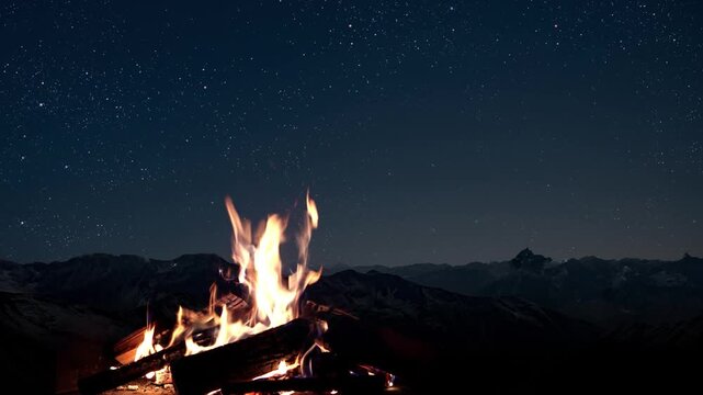 Fireplace with burning wood at night