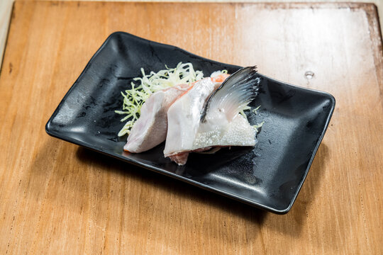 Skin on fish sashimi with cabbage