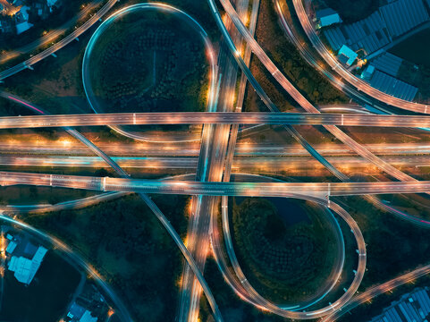 Aerial View of Highway Interchange - Transport concept image, long exposure birds eye view use the drone in Taoyuan International Airport System Interchange, Taoyuan, Taiwan.