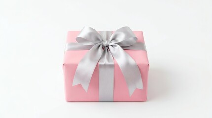 Obraz premium A neatly wrapped pink gift box with an elegant silver satin bow.