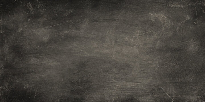 Scratched and worn dark gray wall texture background with vintage look and empty space for writing or drawing